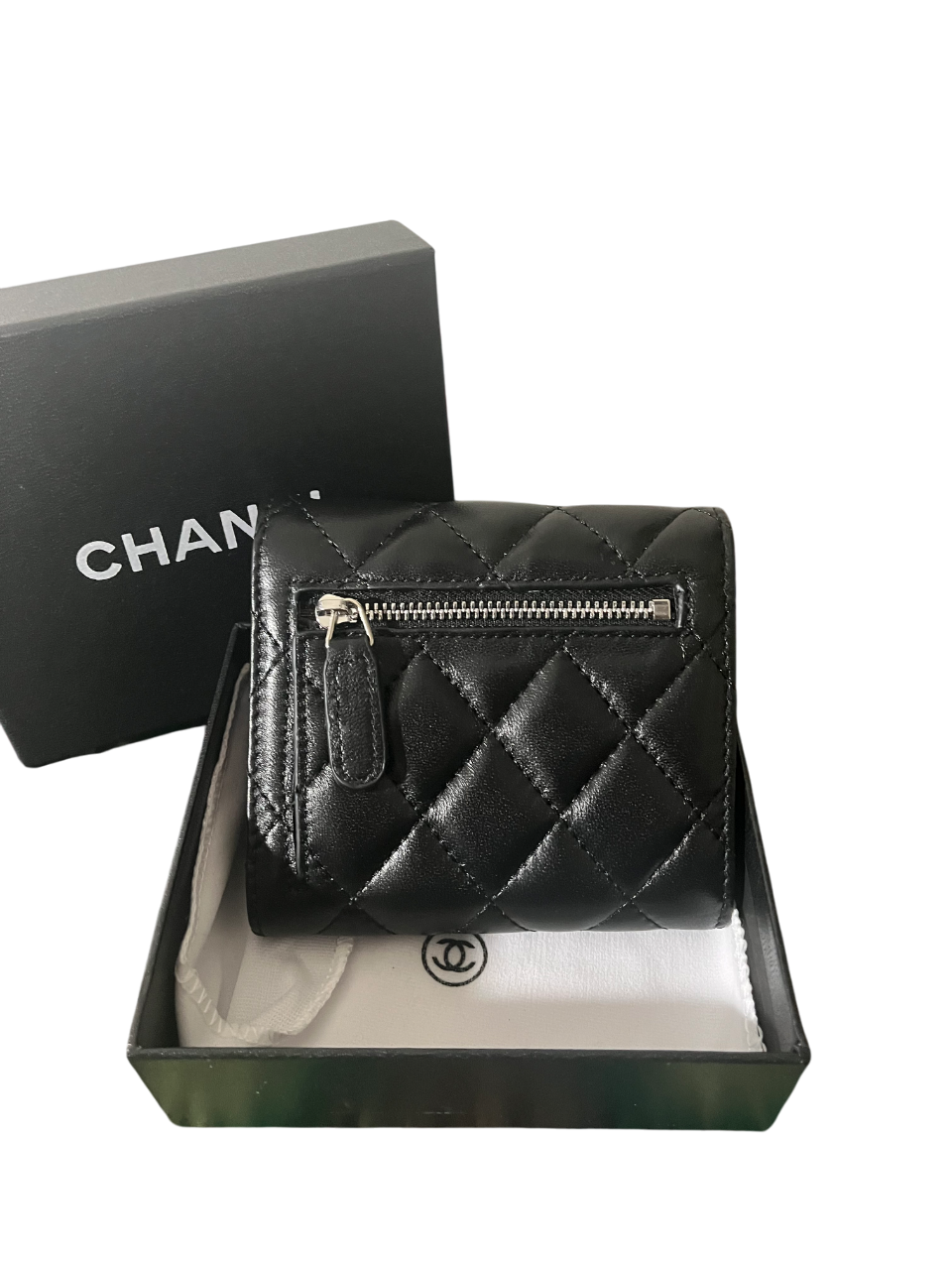 Chanel Lambskin Quilted
Compact Flap Wallet