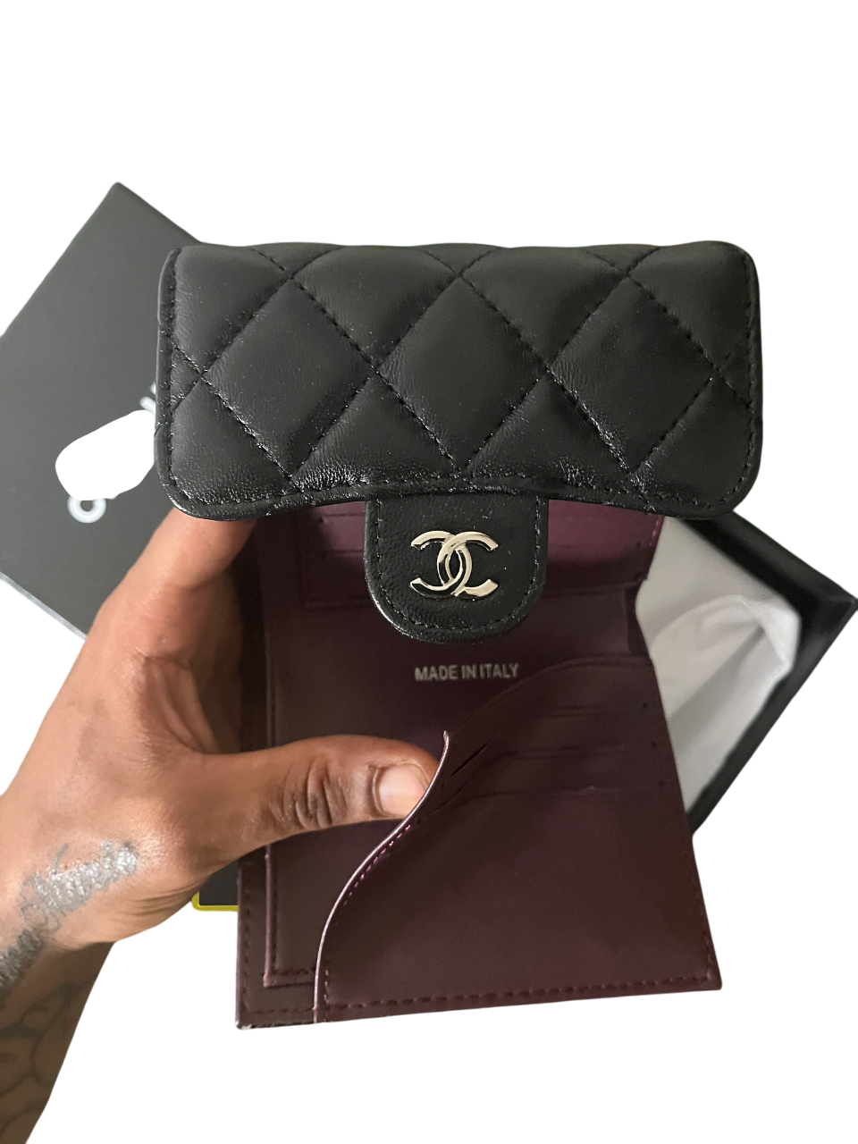 Chanel Lambskin Quilted
Compact Flap Wallet