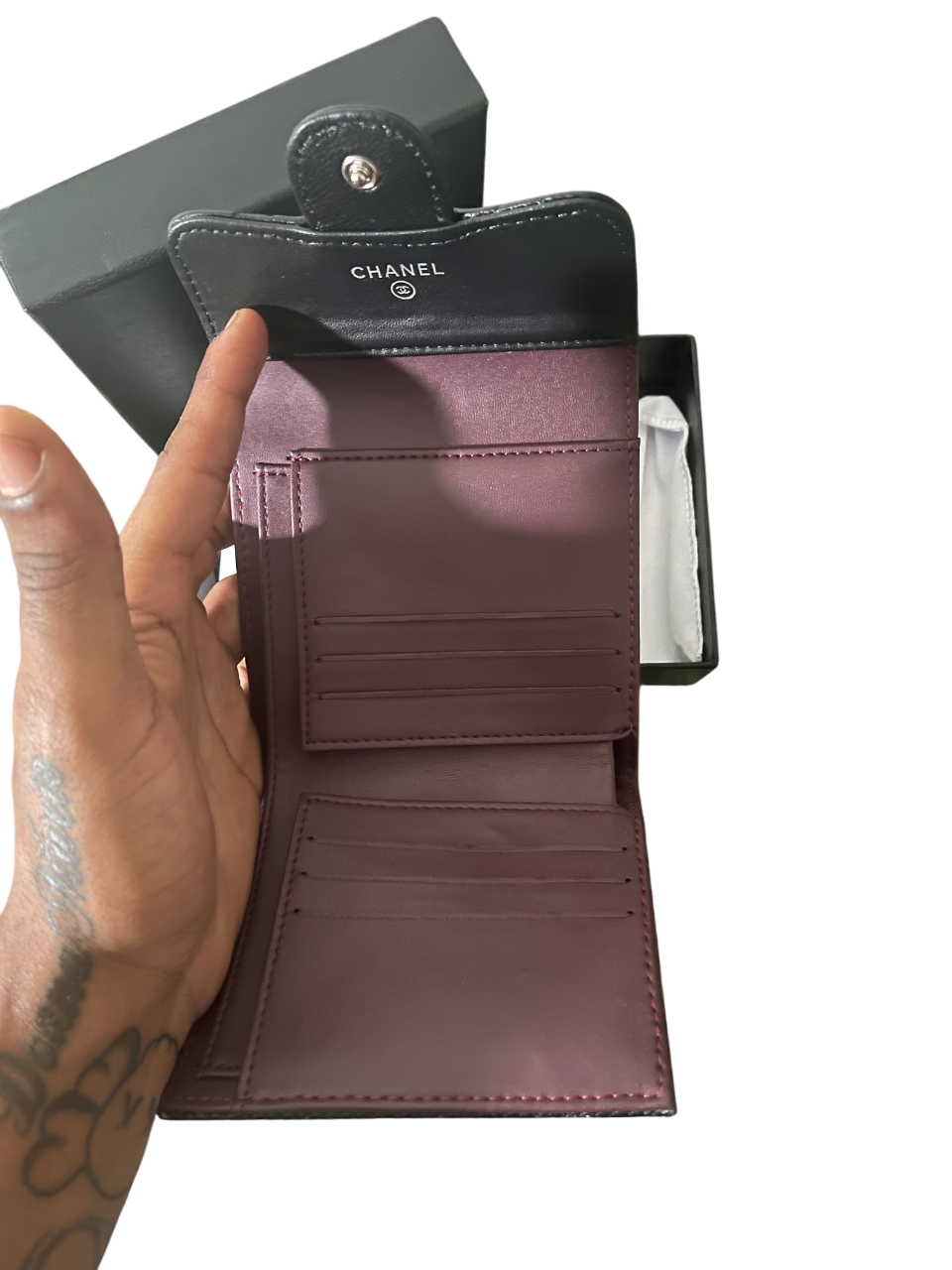Chanel Lambskin Quilted
Compact Flap Wallet