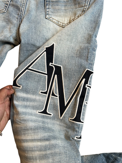 Amiri Black Staggered Logo Blue Jeans