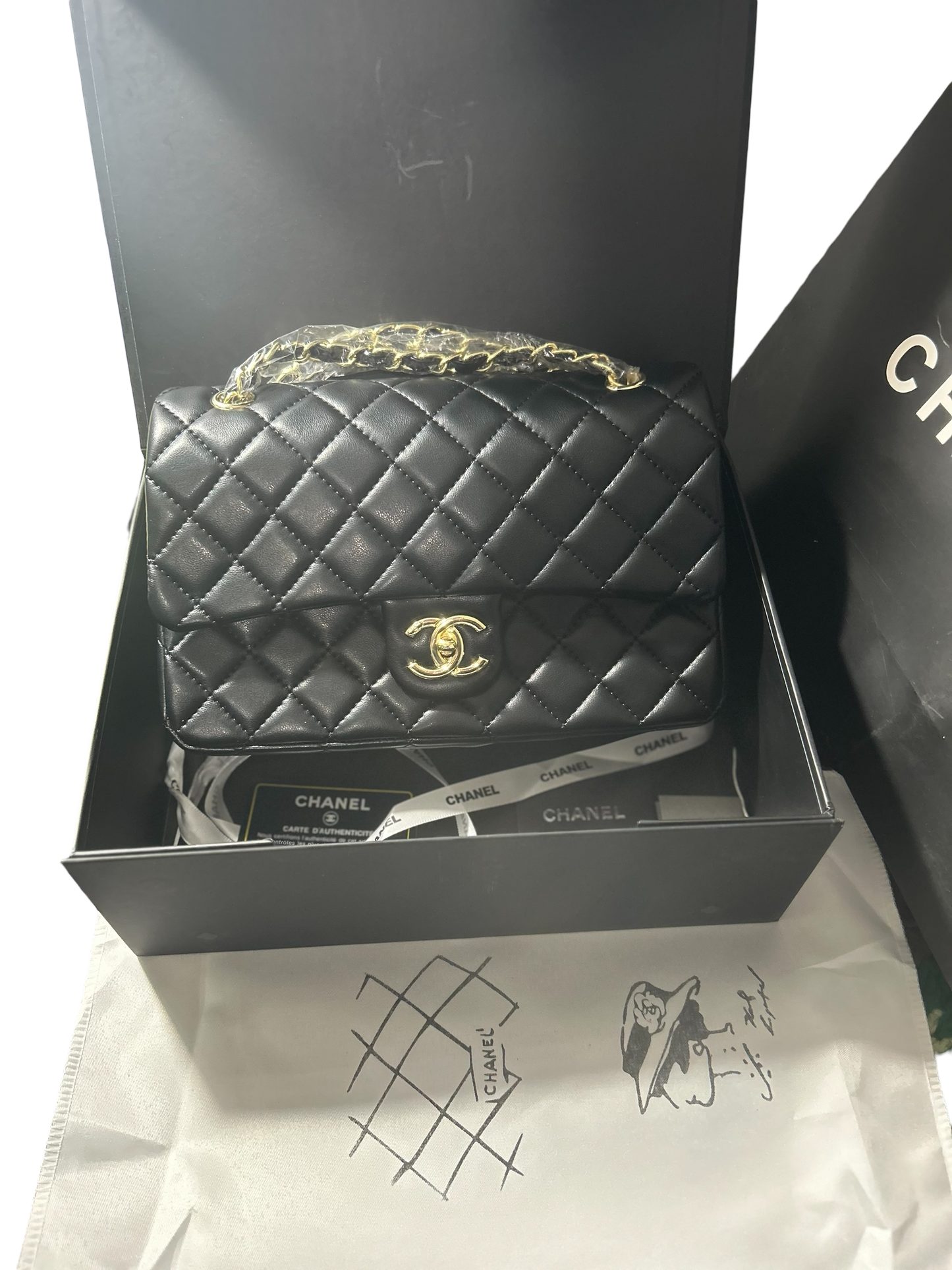 Chanel Black Lambskin Quilted Double Flap Bag