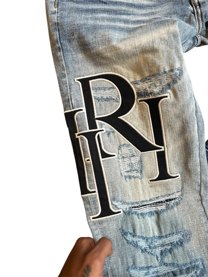 Amiri Black Staggered Logo Blue Jeans