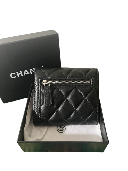 Chanel Lambskin Quilted
Compact Flap Wallet