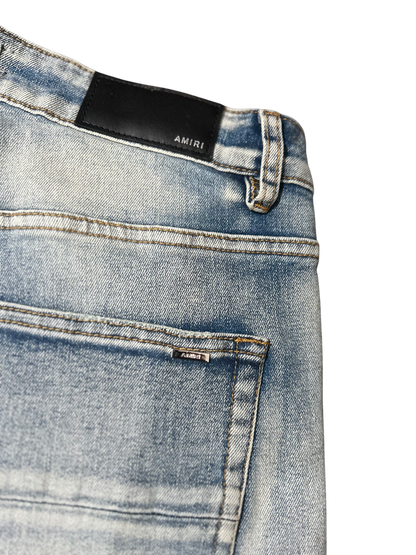 Amiri Black Staggered Logo Blue Jeans