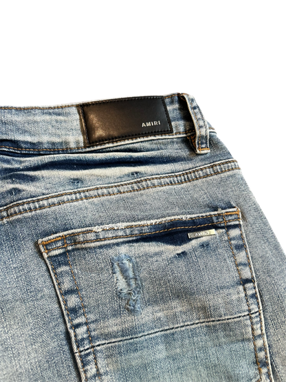 Amiri Black Staggered Logo Blue Jeans