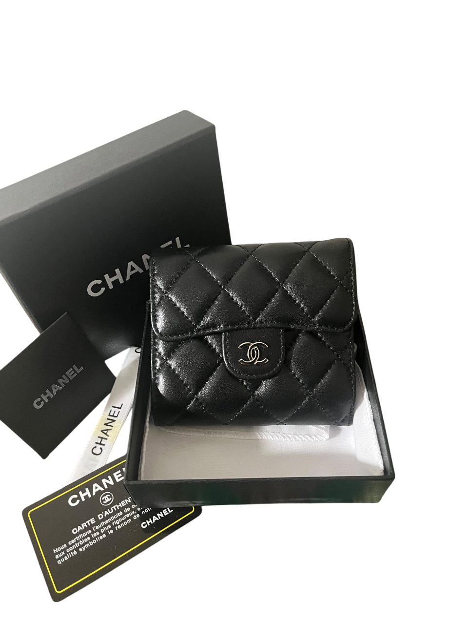 Chanel Lambskin Quilted
Compact Flap Wallet