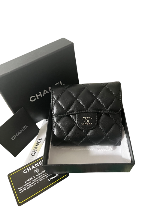 Chanel Lambskin Quilted
Compact Flap Wallet